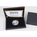 A 9ct gold Numisproof Queen Elizabeth Sapphire Jubilee commemorative coin with certificate, in