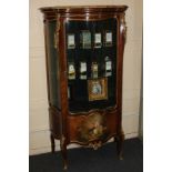 A Vernis Martin style kingwood gilt metal mounted vitrine with shaped breche d'alep marble top above