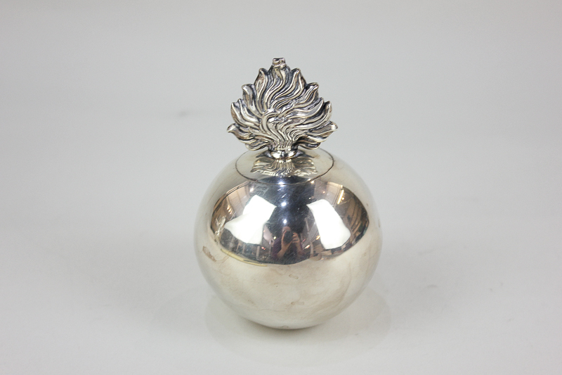 A George V silver table lighter, of globular form with flame finial, maker Stokes & Ireland Ltd,