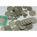 An 1880 US silver dollar, a group of base metal British coinage and commemorative crowns