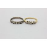 A diamond seven stone half hoop ring in 18ct white gold, and a half hoop ring (one stone missing)