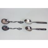 A pair of Norwegian 830 silver marriage spoons, maker David Andersen, monogrammed NBF, with king's