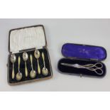 A pair of Victorian silver grape scissors, maker Gilbert and Spurrier, Birmingham 1886, and a