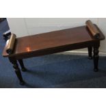 A Victorian mahogany bench with cylindrical end supports, on turned legs, 104cm