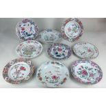 A collection of nine various Chinese porcelain plates with floral decoration on white ground, to