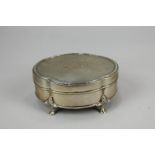 A George V silver dressing table box, makers Stokes & Ireland Ltd, Chester 1911, of scalloped form