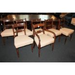 A matched set of seven Regency style bar back dining chairs comprising five, and two similar chairs,