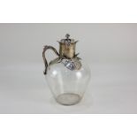 A Victorian silver mounted glass claret jug, maker Edward H Stockwell, London 1881, the neck and