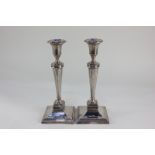 A pair of Edward VII silver column candlesticks, maker Goldsmiths & Silversmiths Co Ltd, London
