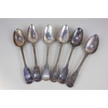 Six George III and later silver fiddle pattern serving spoons, various dates and makers including