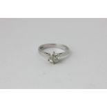 A diamond single stone ring, the old cushion cut stone six claw set in 18ct white gold