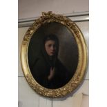 Circle of James Sant, portrait of a girl in green shawl, oil on board, in oval gilt frame, 64cm by