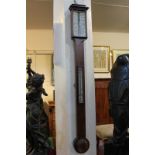 A 19th century mahogany stick barometer thermometer, the ivory dial marked E Hayward of