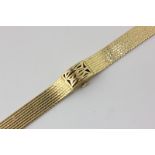 A lady's 18ct gold Bucherer bracelet watch, 58.9g gross