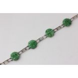 A white gold and jade bracelet carved and pierced with five hardstone panels (a/f)