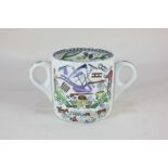 A Ridgways pottery 'God Speed the Plough' loving cup with polychrome decoration