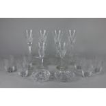 A set of six Waterford crystal fluted drinking glasses, together with a set of six Edinburgh crystal