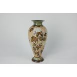 A Royal Doulton Slaters Patent stoneware vase by Emily J Partington, decorated with blossoming