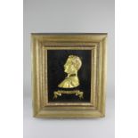 A Victorian profile of Prince Albert, in gilt raised relief, titled Prince Consort, in gilt glazed