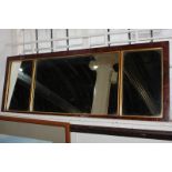 A mahogany and gilt framed rectangular wall mirror, with three mirror plates, 119cm