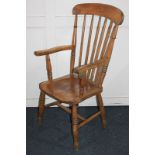 A farmhouse kitchen chair, with spindle back, on turned supports and legs