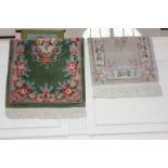 A Chinese wool rug, green ground with pink floral decoration, 69cm by 149cm, together with a similar