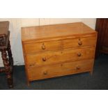 A pine chest of two short over two long drawers, with turned knob handles, 98cm