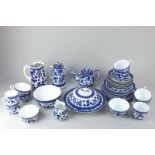 A Coalport and similar porcelain part breakfast set in blue and white floral design, of