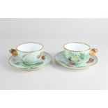 A pair of Victorian Mintons porcelain teacups and saucers with butterfly handles and design, dated