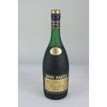 A bottle of Remy Martin Fine Champagne V.S.O.P. cognac, 24 fl.oz., 70% proof