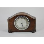 An early 20th century Smiths oak cased eight day mantel clock, 19.5cm wide