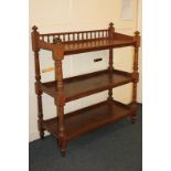A Victorian oak three-tier buffet with raised balustrade gallery back, on turned supports, 102cm