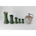 A salt glazed flagon of flattened globular form, 21cm, together with five green pottery vases, to