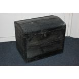 A wooden and metal bound domed top trunk, 65cm