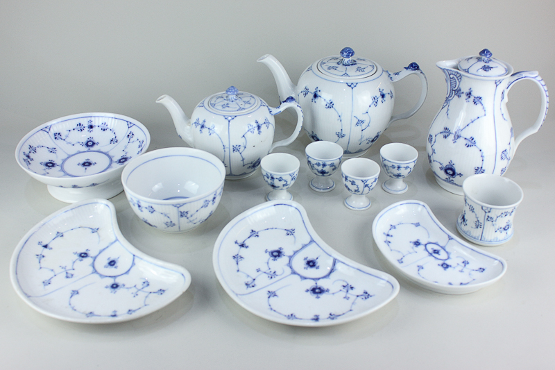 A collection of Royal Copenhagen blue and white floral porcelain tableware comprising two teapots of