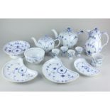 A collection of Royal Copenhagen blue and white floral porcelain tableware comprising two teapots of