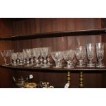 A pair of Waterford crystal wine glasses, a set of seven Edinburgh crystal sherry glasses with three