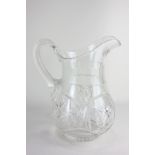 A cut glass water jug, 30cm high