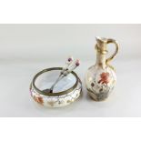 A Royal Bonn porcelain ewer, of baluster form, with floral decoration, the handle formed as a