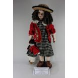 A Knightsbridge Heirloom bisque head doll, Emily 313/1000, with brown hair and eyes, with