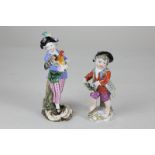 A Meissen porcelain figure of a young man holding a cockerel, 15cm, together with a Continental