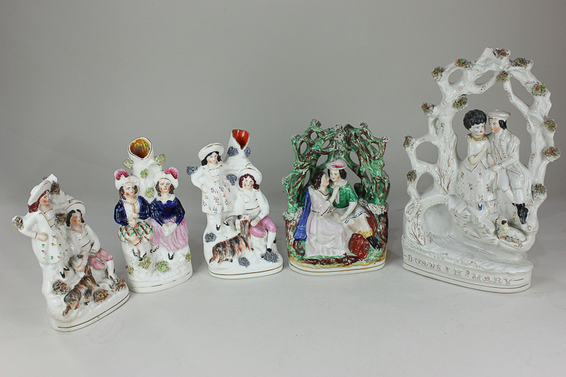 A 19th century Staffordshire pottery figure group of Robert Burns and his Mary, another larger