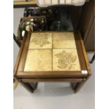 20th cent. Hardwood nest of three tables, top with titles and horse chestnut pattern, made by