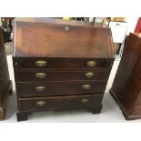 Georgian mahogany bureau, drop flap with fully fitted interior. Graduated four drawers with brass