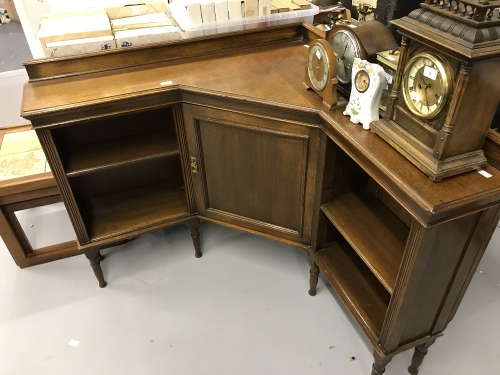 20th cent. Oak corner cupboard, central single door flanked with two open shelved recesses. 60ins. x