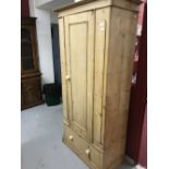 19th cent. Stripped pine wardrobe over one drawer. 34ins. x 74ins. x 18ins.