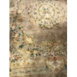 Rugs: Chinese washed rug, beige ground, floral pattern. 12ft. x 10ft.