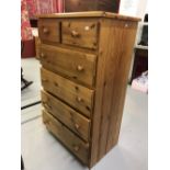 20th cent. Varnished pine two over four chest of drawers. 29ins. x 46ins. x 18ins.