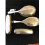 Hallmarked Silver: Dressing table set, two hairbrushes, two clothes brushes decorated with swags.