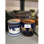 20th cent. Ceramics: Wedgwood Jasper ware vase, Jasper ware pot, Doulton stoneware pot and a